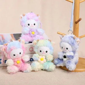 Detailed view of colorful tie-dye plush sheep keychain, cute fluffy toy pendant for bags.