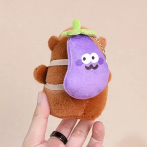 Cute capybara plush keychain with purple eggplant backpack, soft stuffed animal toy gift.