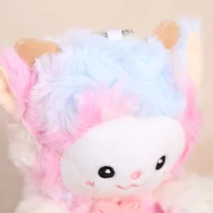Close-up view of colorful tie-dye plush sheep keychain, fluffy texture and cute embroidered face.