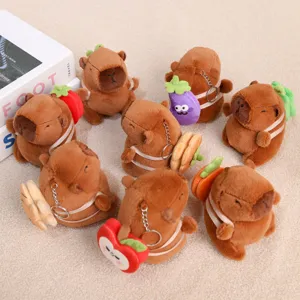 Cute capybara plush keychain with vegetable backpack, soft cartoon animal doll pendant toy.