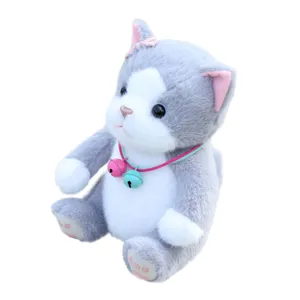 Cute grey plush cat toy with bells, soft stuffed kitten doll for kids and home decor main view.
