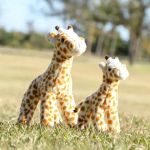 Close-up detail of cute standing giraffe plush toys, soft texture and lovely animal decor.