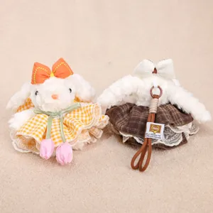 Plush lop-eared rabbit bag pendant with tulip dress and bow, cute bunny toy accessory for girls.