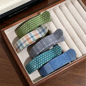 Korean style curved acetate hair claw clip set, elegant plaid and dot duckbill hair accessory.
