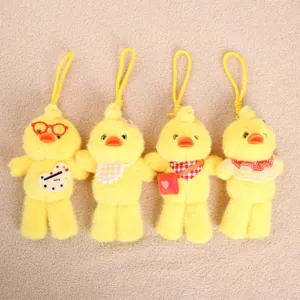 Cute yellow duck plush pendant toy, cute key ring with various cute accessories.