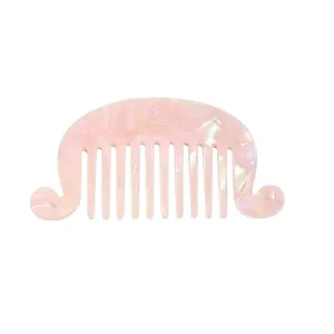 Pink pearlescent acetate hair comb with wavy edges and wide teeth French vintage style.
