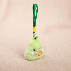 Detailed view of the cute green pear plush toy pendant, showing soft texture and compact size.