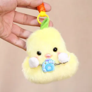 Cute plush pear duck pendant detail view, lovely mini camera accessory keychain bag charm.