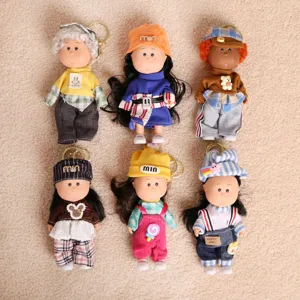 Cute plush doll keychain set, mini dress up doll pendant with stylish clothes and hats.