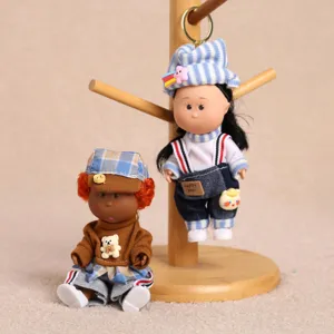 Mini fashion doll set with cute outfits and hats, lovely collectible toy gift.