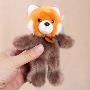 Simpatico ciondolo in peluche di panda rosso portachiavi, morbida borsa charm per bambini.