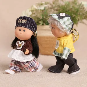 Cute plush doll keychain miniature cute toy set with stylish clothes and mini hat.