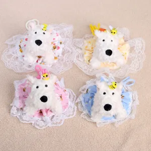 Grazioso portachiavi in peluche cucciolo con abito floreale, morbida bambola dettaglio.
