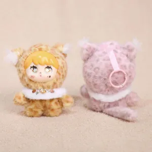 Cute leopard vinyl plush doll detail showing fluffy texture and secure pink hanging ring design.