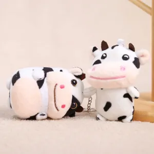Simpatico portachiavi in peluche di mucca bianco e nero, morbido ciondolo per borsa.