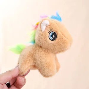 Close-up view of the cute cartoon pony plush toy, showing soft colorful mane and embroidered eyes.