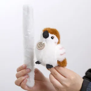 Cute sparrow plush toy with long slap bracelet band, soft stuffed animal bag charm accessory.