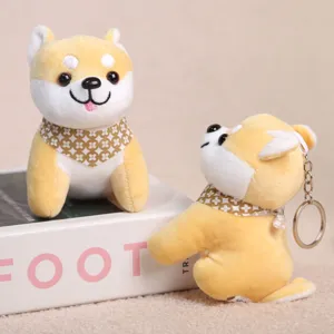 Cute Shiba Inu plush toy keychain detail showing soft fabric and metal ring accessories.