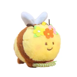 Cute plush bee keychain toy with flowers and basket, soft stuffed animal bag pendant charm.