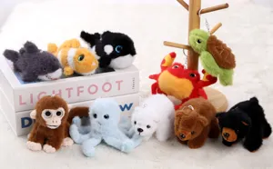 Detail view of cute ocean animal plush keychains, showcasing various soft stuffed toys.