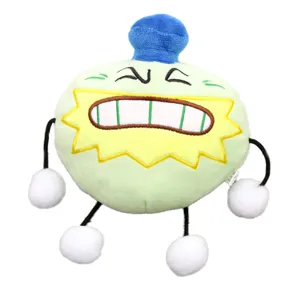 Süßes grünes Plüschtier Puppe mit blauem Hut und lustigem Zähnen Design, weiches Kuscheltier.