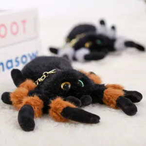 Cute fluffy tarantula spider plush keychain with big glitter eyes. Soft toy pendant.
