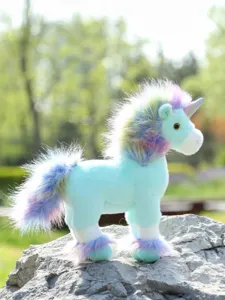 Detailed view of the cute standing rainbow unicorn plush toy with colorful mane and tail.