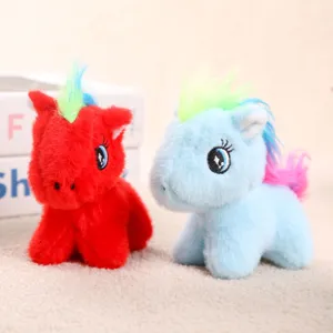Close-up detail of colorful plush pony toy pendant with soft fur and embroidered eyes.