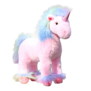 Cute pink unicorn plush toy with rainbow mane and tail, soft stuffed animal doll gift.