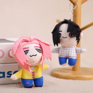 Cute chibi anime plush keychain toy, soft cartoon doll pendant for bag decoration detail view.