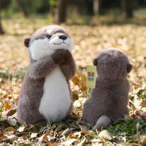 Cute otter plush toy, blessing posture stuffed animal doll, soft toy gift for kids. detail shot
