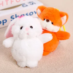 Cute plush bunny and fox toy pendant, soft stuffed animal doll for kids gift and bag decor.
