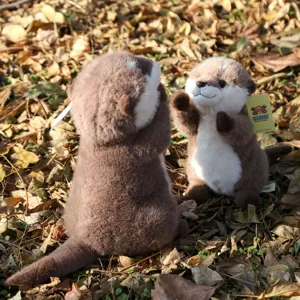 Cute simulation otter plush toy doll, soft stuffed animal gift for kids birthday decor.
