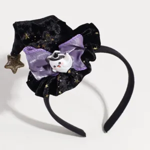 Halloween witch hat hair hoop detail, featuring cute ghost charm and purple satin bow.