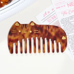 Exquisite acetate cat hair comb with tortoiseshell pattern, portable and smooth hair styling tool.