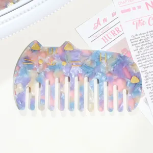 Cute cat acetate hair comb with pastel gradient tortoiseshell texture, portable styling tool.