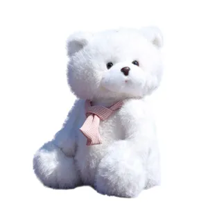 Simpatico orsetto di peluche bianco con sciarpa rosa lavorata, morbida bambola regalo.