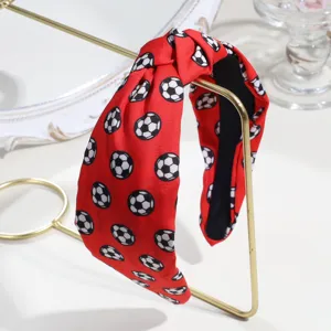 Red soccer print knotted fabric headband detail, stylish sports style wide hair accessory