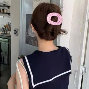 Graziosa molletta per capelli ovale a pois rosa da donna, accessorio capelli trendy.