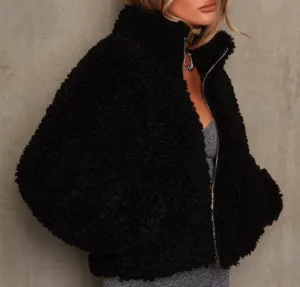 Black fleece teddy jacket for women, short winter fuzzy coat with high collar and zipper.