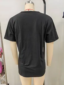 Back view detail of casual plain black short sleeve t-shirt, showing fit and fabric texture.