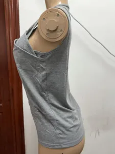 Gray sleeveless tank top for women, casual basic v-neck vest shirt for daily wear or sports.