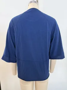 Solid color crew neck 3/4 sleeve loose t-shirt for women, comfortable casual summer top.