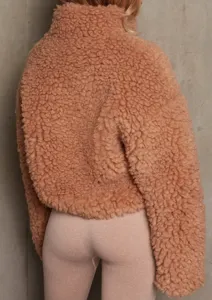 Back view detail of women's cropped sherpa fleece jacket, cozy teddy winter outerwear.