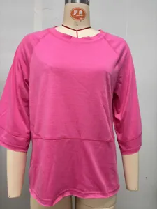 Pink 3/4 sleeve round neck spliced loose t-shirt detail showing stitch texture and fit