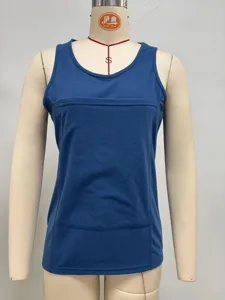 Detailed view of blue kangaroo pouch sleeveless t-shirt, showing front pocket structure.