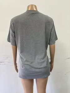 Grey short sleeve t-shirt fabric detail view, comfortable knit material for daily wear.