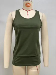 Detailed view of dark green sleeveless babywearing tank top with functional kangaroo pouch design.