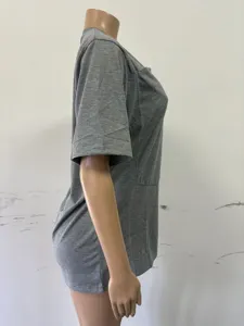 Grey short sleeve t-shirt side view on mannequin with kangaroo pocket design detail.