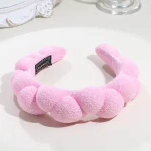 Pink fluffy cloud sponge headband for daily makeup, facial washing, and cute hair styling.